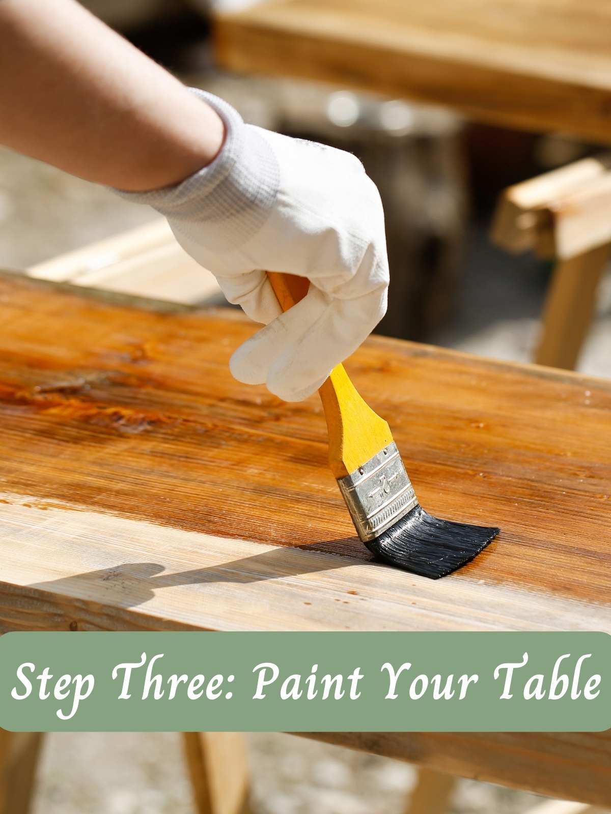 Step Three: Paint Your Table. Photo of table being painted.