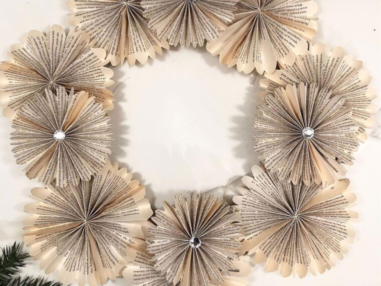 a book page wreath made from circular paper fans